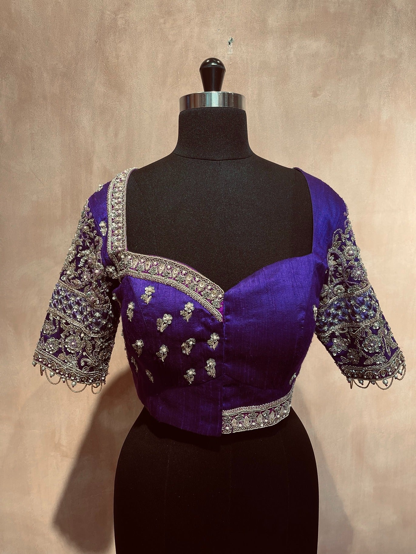Elegant purple intricate sleeve blouse