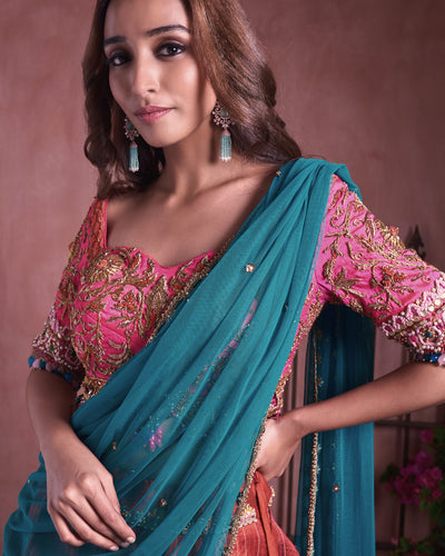 Multicolored border lehanga with tasselled tulle dupatta and zardosi heavy embroidered blouse