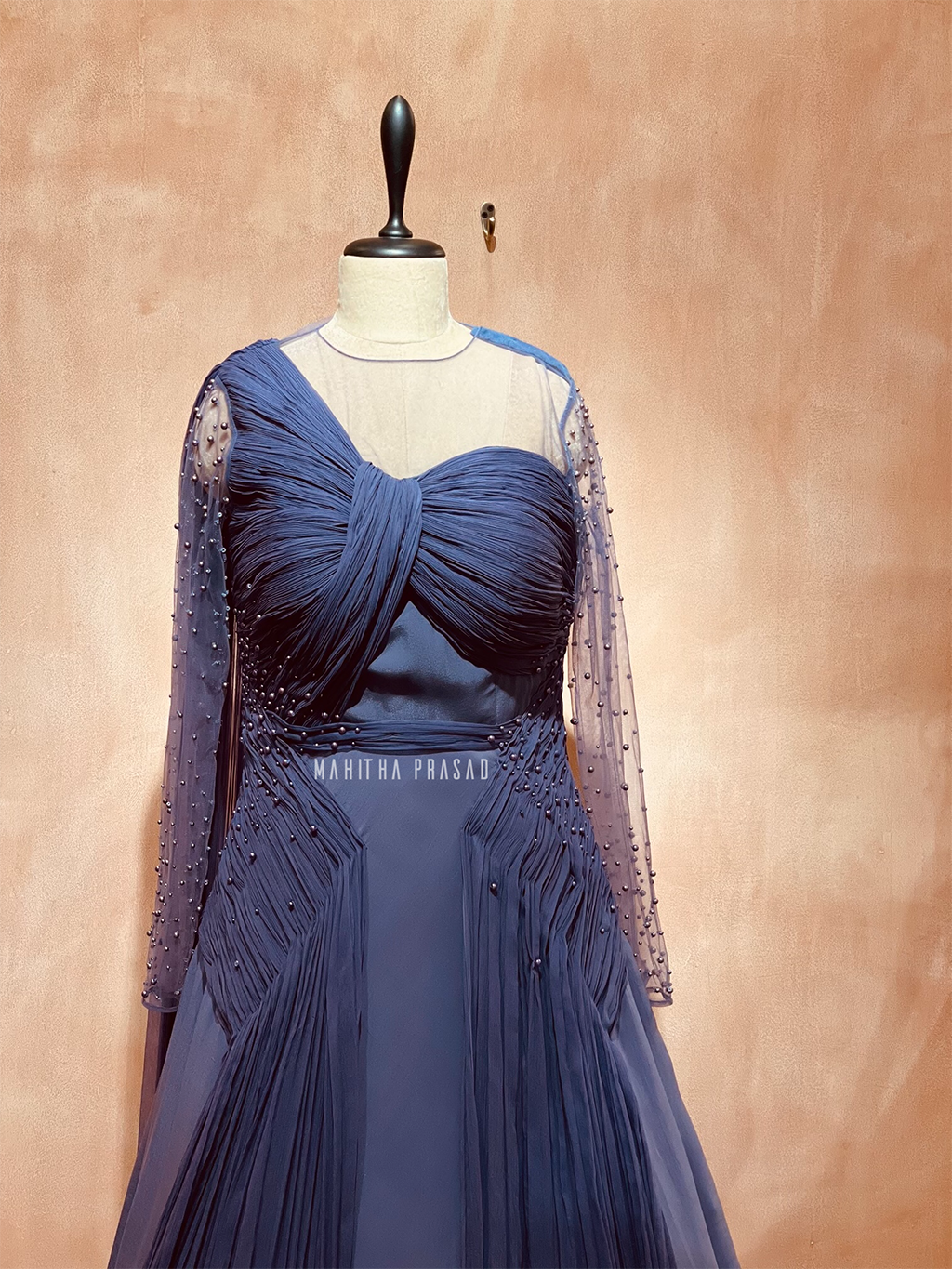 Full sleeve draped lilac chiffon gown