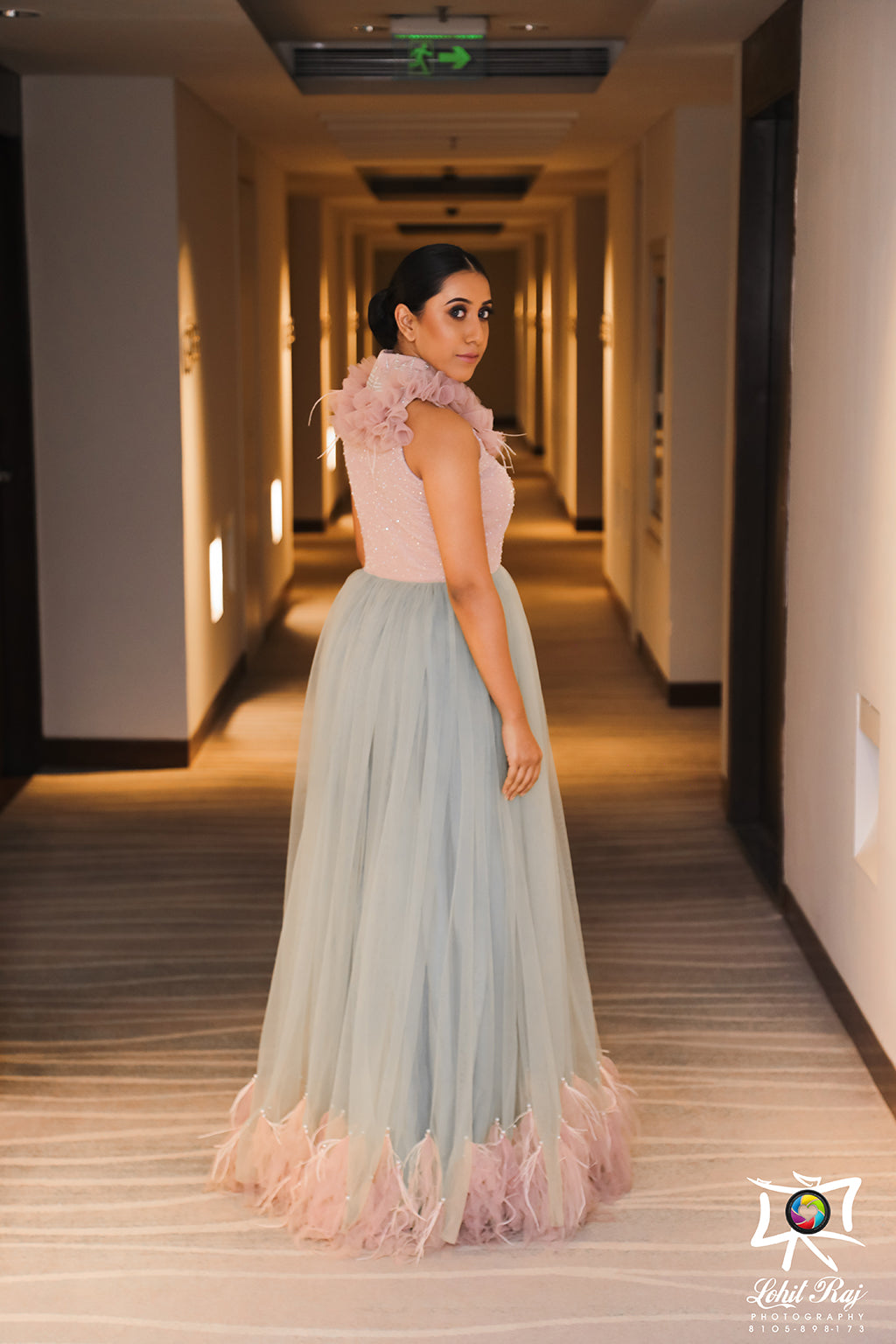 Turtle neck with ruffle detail gathered tulle A-line gown