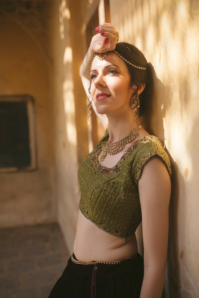 Wine velvet panelled lehenga with multicolor border detail ,with cap sleeve green blouse and mustard tulle dupatta