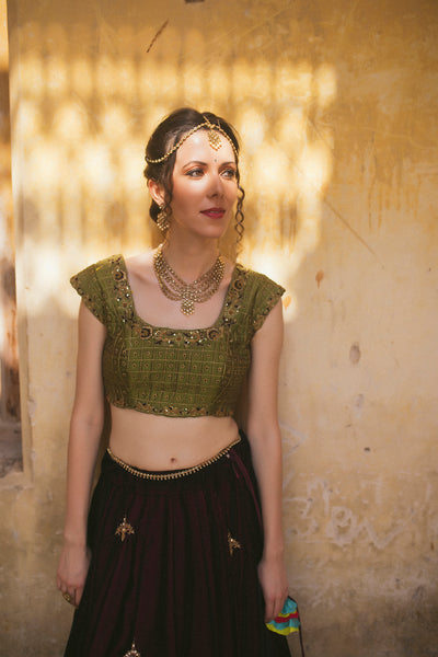 Wine velvet panelled lehenga with multicolor border detail ,with cap sleeve green blouse and mustard tulle dupatta