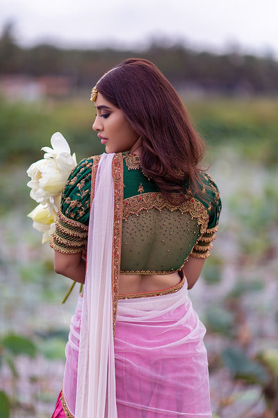 Puff sleeve high neck jewel blouse with pink tussar silk pleated skirt and beige tulle dupatta