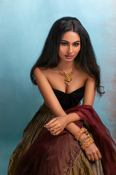 black velvet bustier blouse,black gold mix tissue gathered lehenga,with organza dupatta