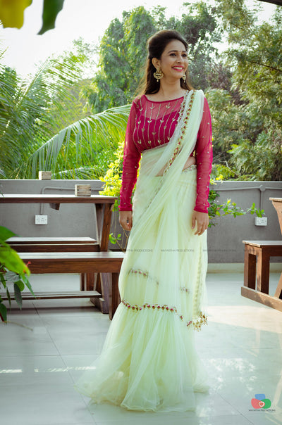 Full sleeve boat neck tulle blouse with neon green tulle saree